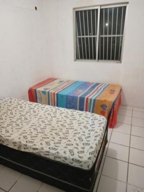 Quarto em Apartamento Mobiliado em Condomínio